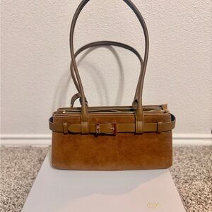 Charles & Keith Jodi Genuine Suede Belted shoulder bag
Ember Brown
With box